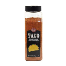 Wellsley Farms taco seasoning jar with black lid; brown spice powder and label