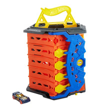 Hot Wheels Roll Out Raceway track playset with red, blue, and yellow storage base