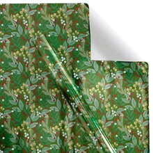 Floral wrapping paper with green background, red berries and leaf pattern