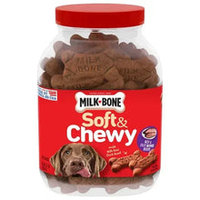 Dog treat jar with brown bone-shaped soft & chewy treats, red lid