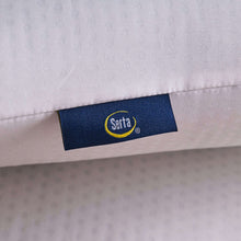 Close-up of white cooling pillow with Serta logo fabric tag