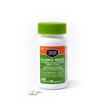 Cetirizine HCl allergy relief tablets bottle with green cap, tablets nearby