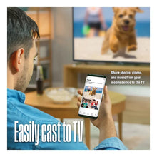 Roku TV with smartphone casting app displayed on the TV screen