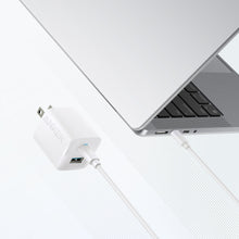 White Anker 33W wall charger with cable plugged in