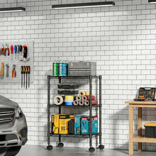Black 3-tier metal shelving unit with wire shelves holding tools and boxes