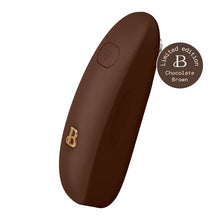 Chocolate-brown electric can opener shown at an angle, with gold B emblem
