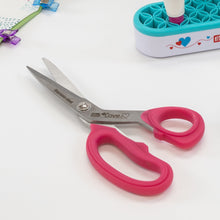Dressmaker scissors with stainless steel blades and pink handles, open