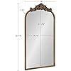 Gold arched wall mirror with baroque frame and hanging loop