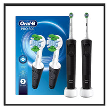 Oral-B Pro 500 electric toothbrush pair with white brush heads and black handles