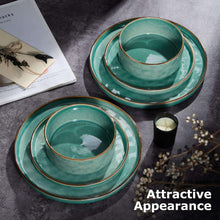 Green stoneware plates and bowls stacked with matching inner rims.