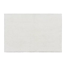 White plush micro polyester bath rug, flat rectangle with short pile