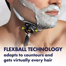 Shaving razor gliding on skin with lather, flexball-style pivot head.