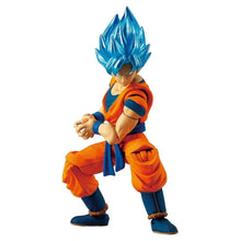 Orange and blue action figure with spiky cyan hair, crouching stance