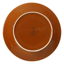Caramel ceramic bowl underside with circular stamp and white interior ring
