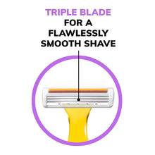 Triple-blade razor cartridge close-up centered above yellow handle.