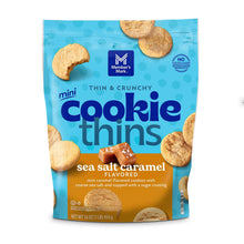 Member's Mark salted caramel cookie thins in a turquoise and orange bag, front view.