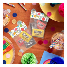 M&M's fun size candy packets arranged together in multiple wrappers