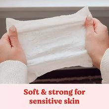Pack of baby wipes with folded white wipe held open