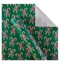 Reversible Christmas gift wrap sheet with green candy cane and white snowflake pattern