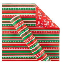 Reversible Christmas gift wrap sheet with red and green striped pattern and ribbon detail