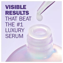 Olay Super Serum jar lid close-up with dropper tip and visible serum