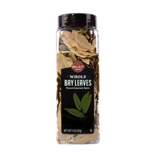 Whole bay leaves in a clear plastic jar with black lid