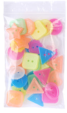 Clear reclosable bag filled with colorful plastic craft pieces, white zip seal at top