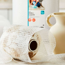 Rolled white small-bubble bubble wrap with open center tube for packaging