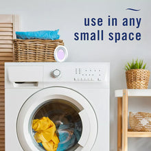 Febreze plug-in air freshener on shelf near washing machine, oval lavender window