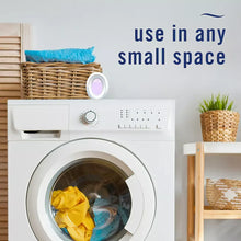 Febreze bathroom air freshener device with purple scent disk on washer