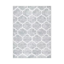 Geometric area rug with light gray quatrefoil pattern on medium gray background