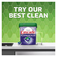 Cascade dishwasher detergent tub with green lid on countertop