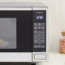 Microwave oven control panel with digital timer display and keypad