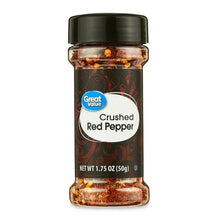 Crushed red pepper shaker jar with black lid and red pepper flakes