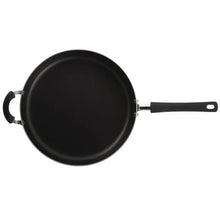 Black nonstick chef pan with long handle and side loop handle, top view