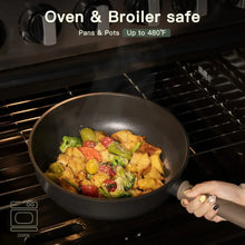 Black nonstick frying pan in an oven with food being cooked