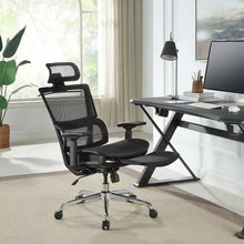Ergonomic mesh office chair in black with headrest, armrests, and footrest