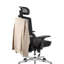 Black mesh office chair with headrest and footrest, with light fabric draped over back