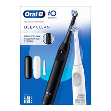 Electric toothbrush set with black and white handles, boxed, dual-pack.