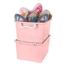 Pink stackable plastic storage baskets, with stuffed toys in the top basket