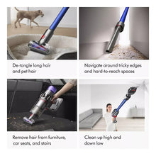 Cordless vacuum on carpet removing pet hair with brush head