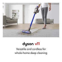 Dyson V11 cordless vacuum upright on carpet with motorized floorhead