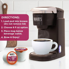 Coffee maker with a mug of decaf raspberry chocolatté and a single pod