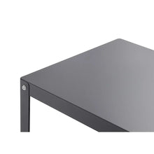 Dark grey metal shelf corner with underside support and screws.