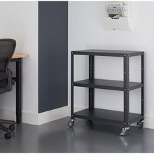 Dark grey metal utility cart with three shelves and four locking casters