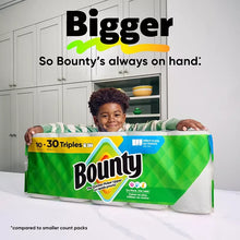 Bounty paper towels multipack, green box held on a kitchen counter