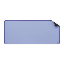 Logitech lilac desk mat with raised lip corner and stitched border