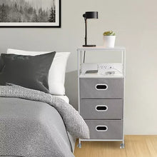 Gray felt three-drawer cart with white frame on caster wheels