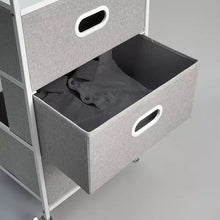 Open gray felt drawer with oval handle and folded fabric liner