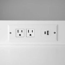 Charging panel on a rolling cart shelf with power outlets and USB port